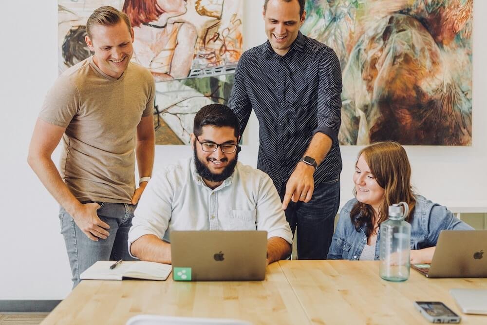 Custom CRM development team planning business workflows and system requirements
